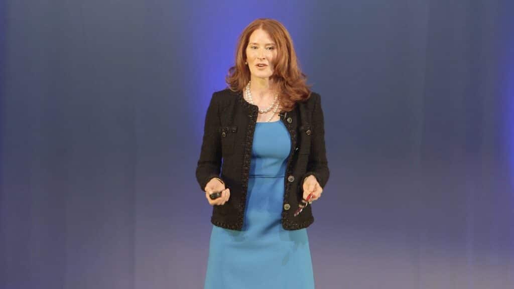 Anne Collier speaking at a conference